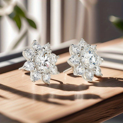 Capture the beauty with our Sunflower Moissanite Stud Earrings. Available in 0.5/1/2/3 Carat Flower Shape design, crafted with 925 Silvery. Makes a perfect Valentine's Day Gift, comes with a Gift Box. Weighing 3.1/4.2/6/6.6g, adorned with shimmering