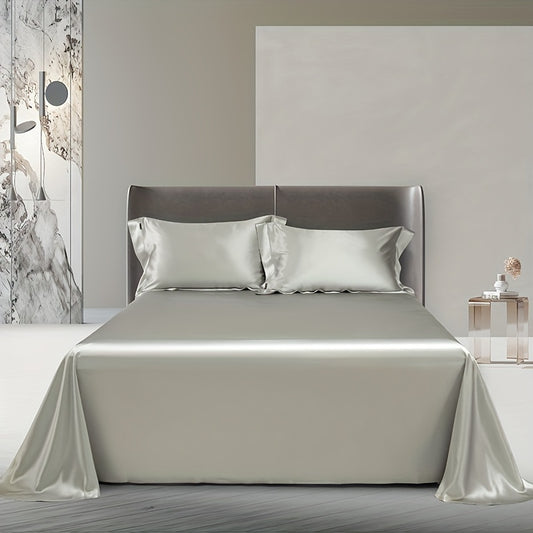 Luxurious soft satin flat sheet in solid color made of machine washable polyester. Perfect for bedroom decor.