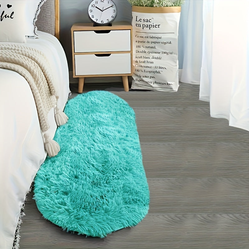 Soft faux fur oval area mat that is luxurious, plush, non-slip, hand washable, and durable. Perfect for adding a touch of elegance to your bedroom, living room, or home decor. Available in two sizes.