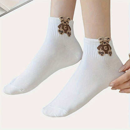 5 pairs of cute cartoon print white socks for women, soft and breathable.