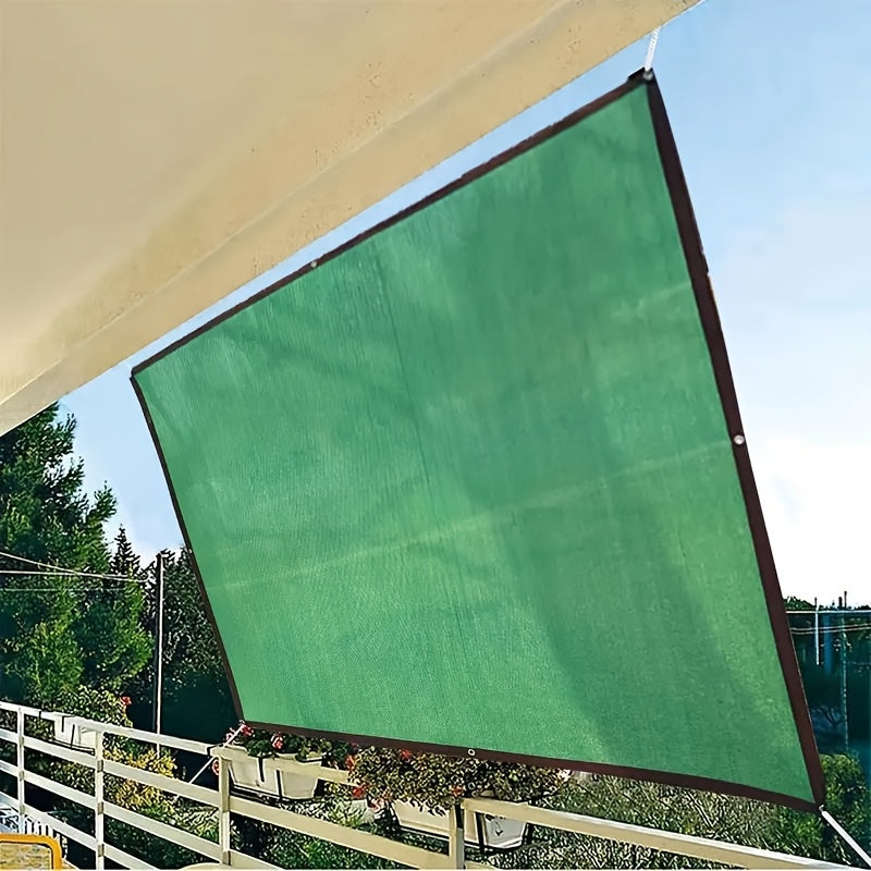 Large green sunshade net for outdoor use in pool, garden, or balcony. Water-resistant fabric, suitable for all seasons, with hook and loop closure.