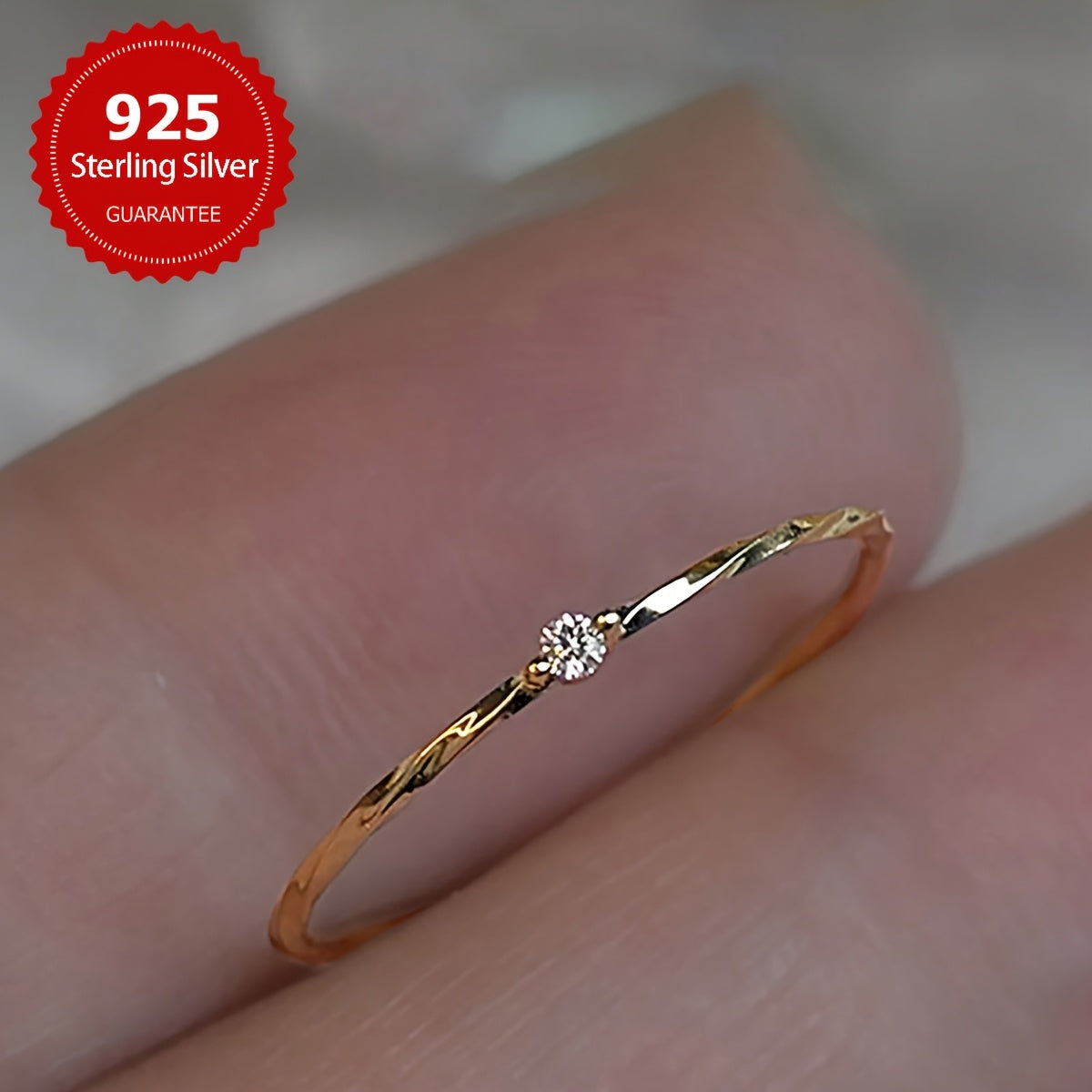 Chic and minimalistic 925 sterling silver ring accented with small 5A synthetic cubic zirconia. This lightweight and versatile jewelry piece is perfect for women to wear daily, to parties, and during Ramadan - suitable for all seasons.