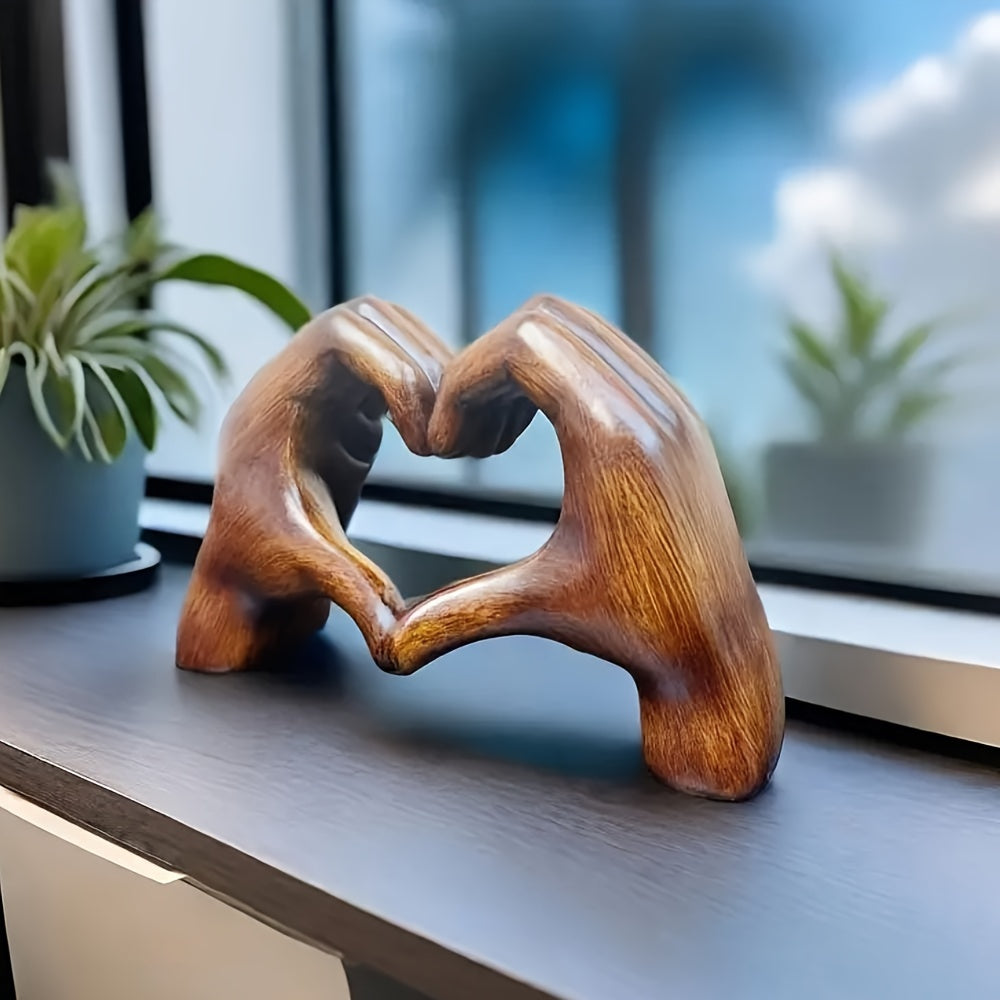 Heart-shaped resin sculpture for home or office decor. Perfect gift for holidays or special occasions.