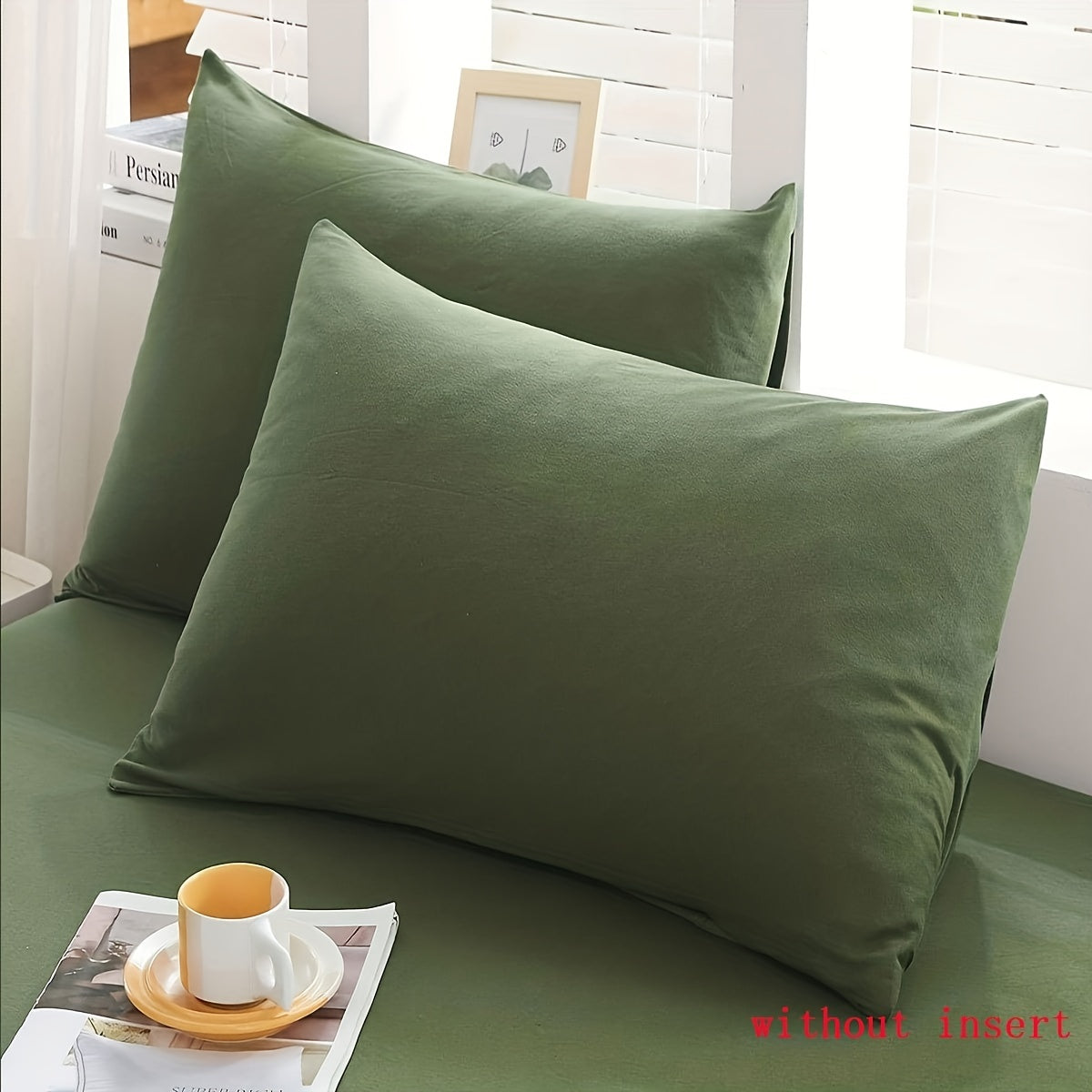 Two luxurious Army Green pillowcases made of soft brushed polyester, featuring a 100% weave. These pillowcases are machine washable and have a zipper closure for easy use. They are both elegant and durable, making them perfect bedroom accessories for