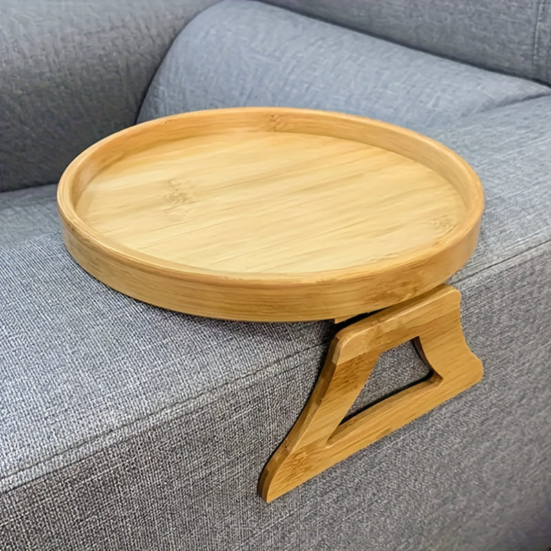 The 1PC Classic Bamboo Sofa Arm Tray Table is a versatile and convenient accessory for your home. This foldable round side table features a non-slip surface, making it perfect for holding snacks and remotes while you relax on the sofa or in bed. It is