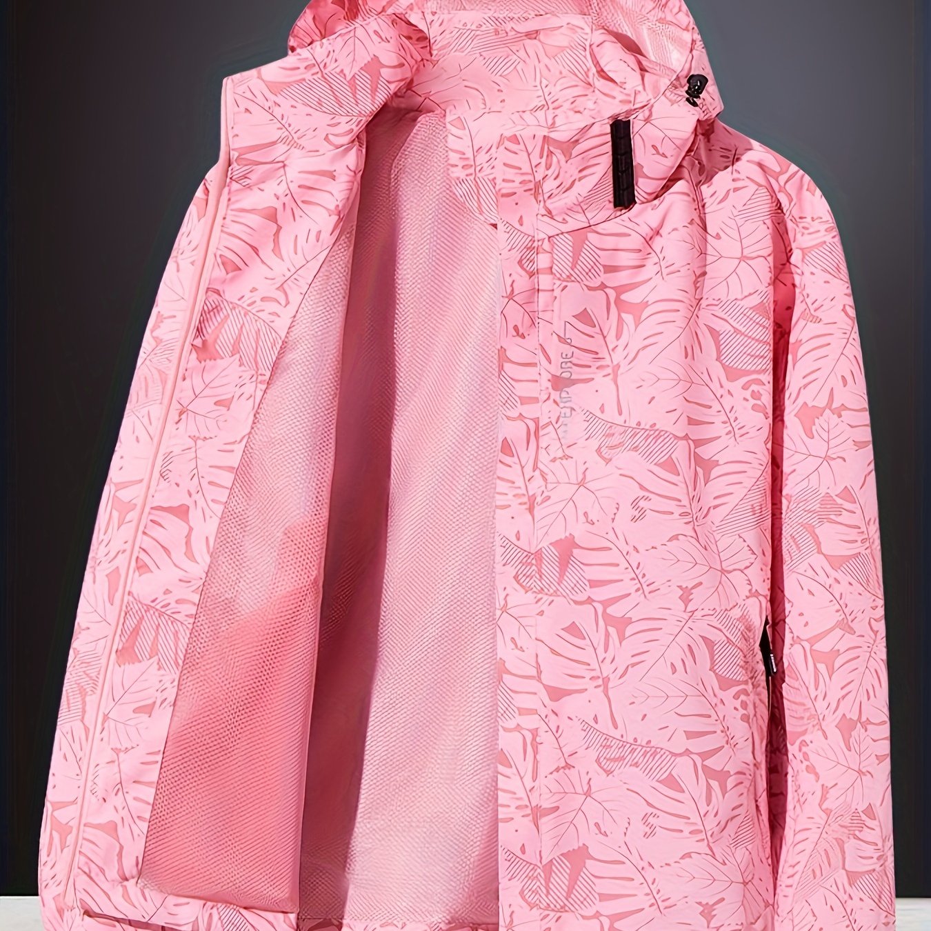 Women's outdoor sports jacket with water-resistant and windproof features, detachable hood, and zipper closure.