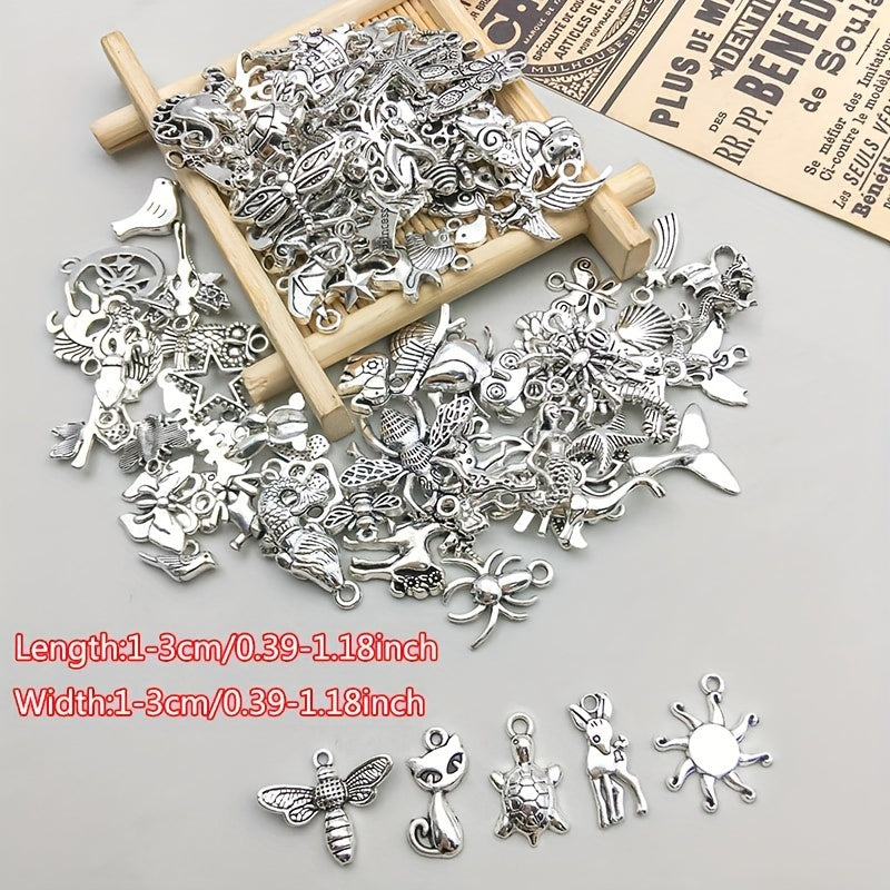 100 pieces of metal mixed jewelry making charms, vintage animal charms for DIY necklace making.