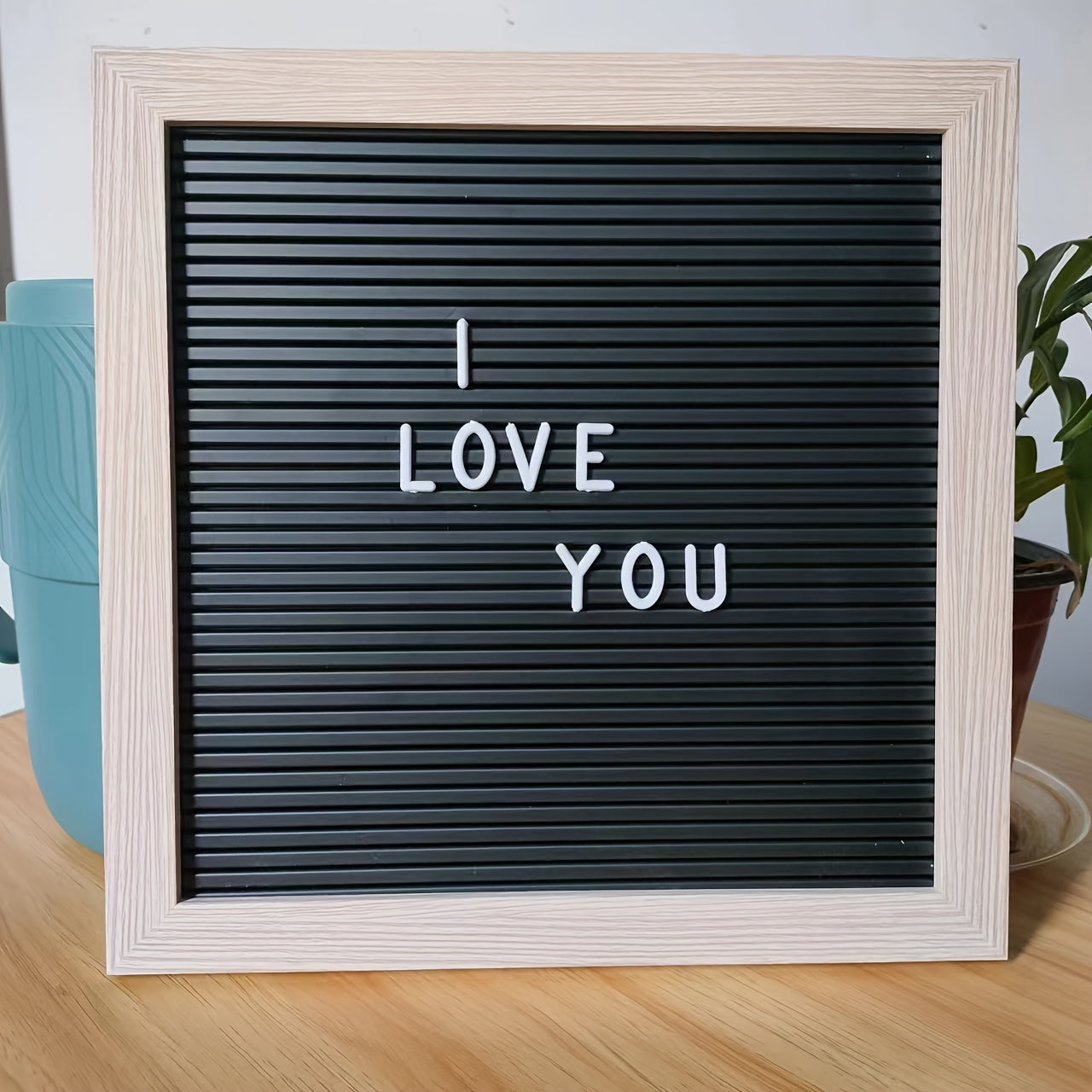 25.4x25.4 cm Blister Message Board with 147 replaceable letters, numbers, and symbols.