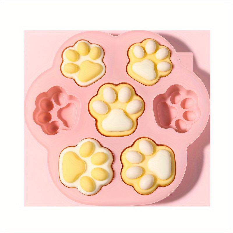 Pink Silicone Paw Print Treat Mold with 7 cavities - non-stick, food-grade silicone for baking a variety of treats including dog treats, cookies, candy, chocolate, and jelly. Perfect for baking with silicone molds.