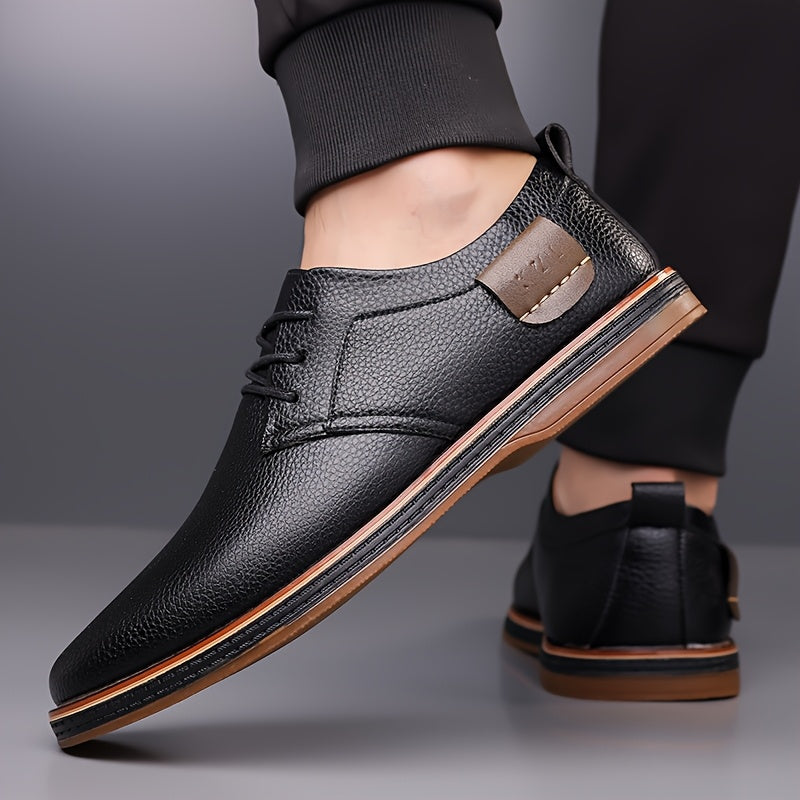 One pair of men's business casual shoes with hand stitched low top lace-up design, flat rubber sole, faux leather upper, inner lining and insole.