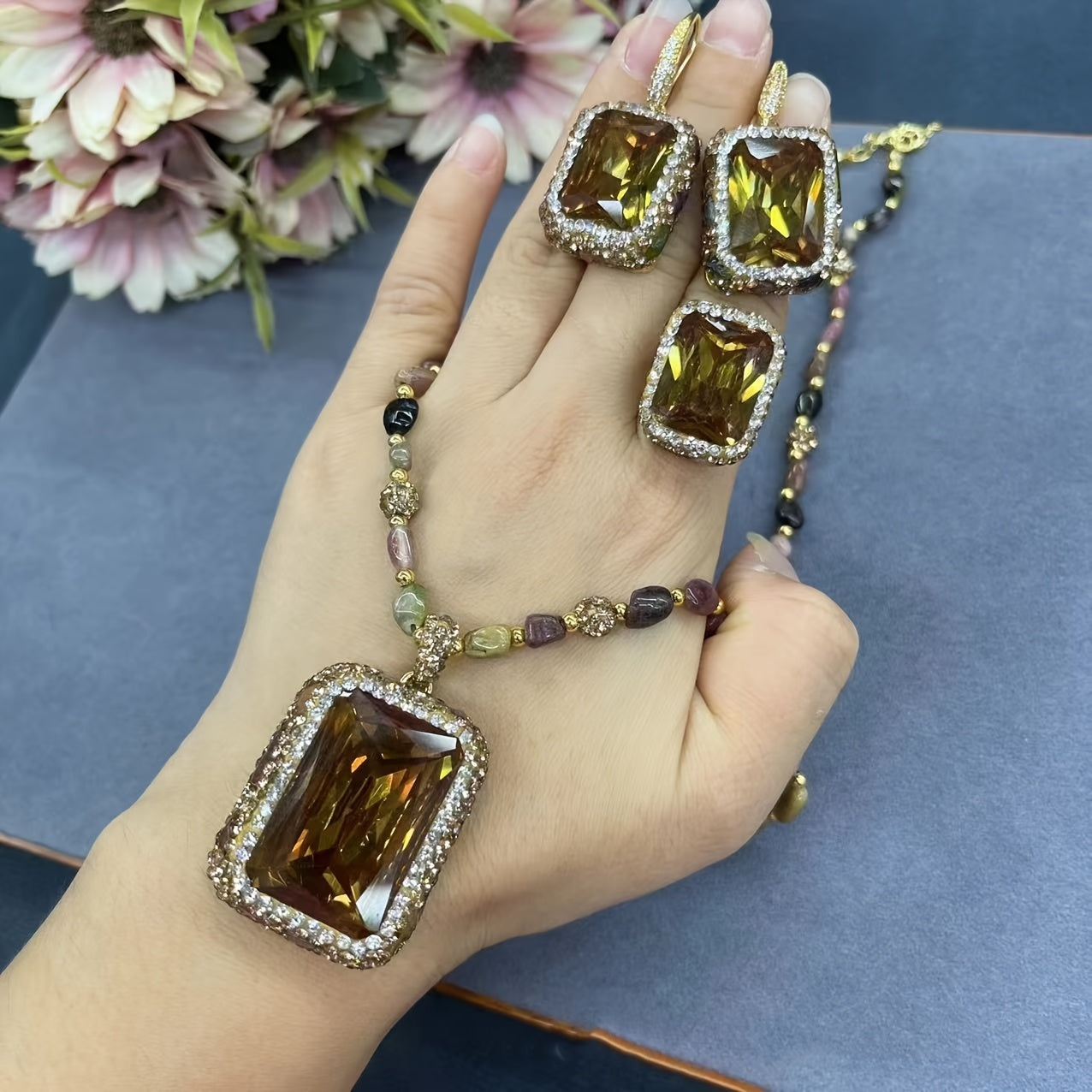 Complete your everyday look with this Boho-Chic 3-piece Jewelry Set featuring stunning Color-Shifting Turkish & Sudanese Stones - Set includes Necklace, Earrings, and Ring for a touch of glamour.