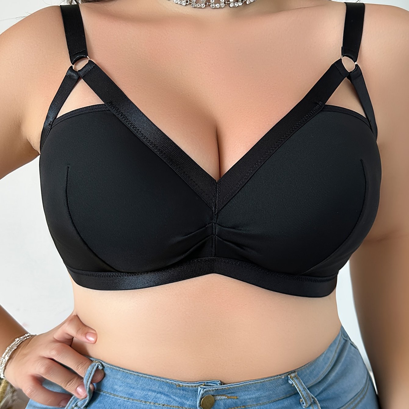 Polyester knit V-neck bralette for plus size women with medium stretch, solid color, collarless design, wire-free, and pullover style.