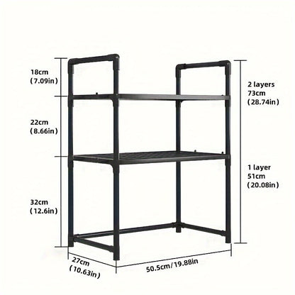 The Expandable Double-Layer Microwave Rack with Classic Style features 4 Hooks for added convenience. This Multi-functional Kitchen Storage Organizer is constructed with Metal and Plastic materials. Assembly is required, but no batteries are needed.