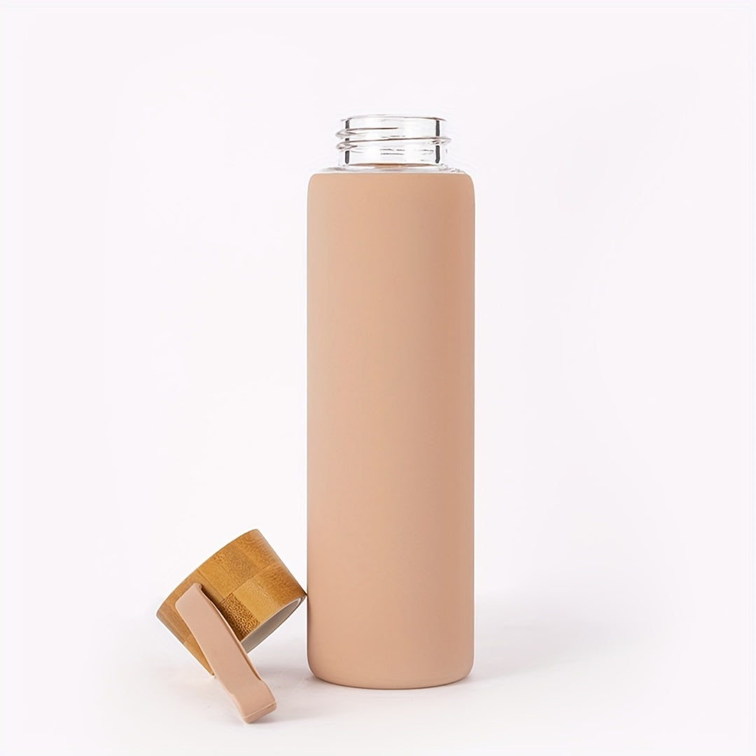 Silicone sleeve glass water bottle with strap, dishwasher safe.