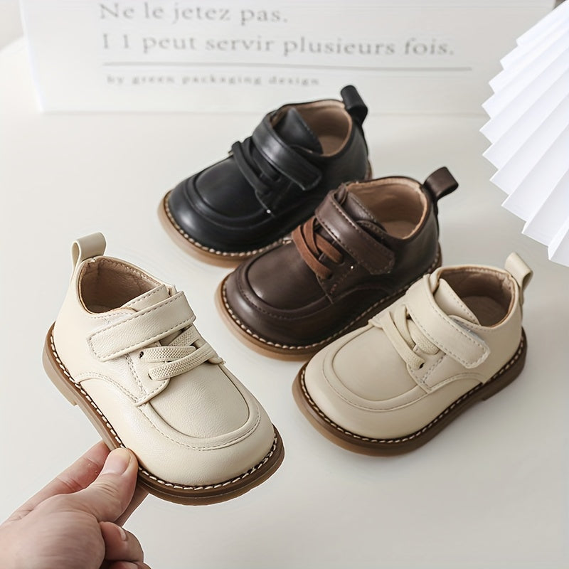 Kids British-style striped tassel crib shoes for toddlers, with lightweight microfiber synthetic upper and TPR sole for all-season wear in spring and fall.