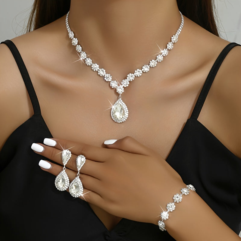 Bridal Jewelry Set: Exquisite Luxury 925 Silver Plated Set with Flower Design and Synthetic Diamonds, Featuring a Copper Construction. Includes Teardrop Necklace, Earrings, and Bracelet - Perfect for Weddings and Banquets.