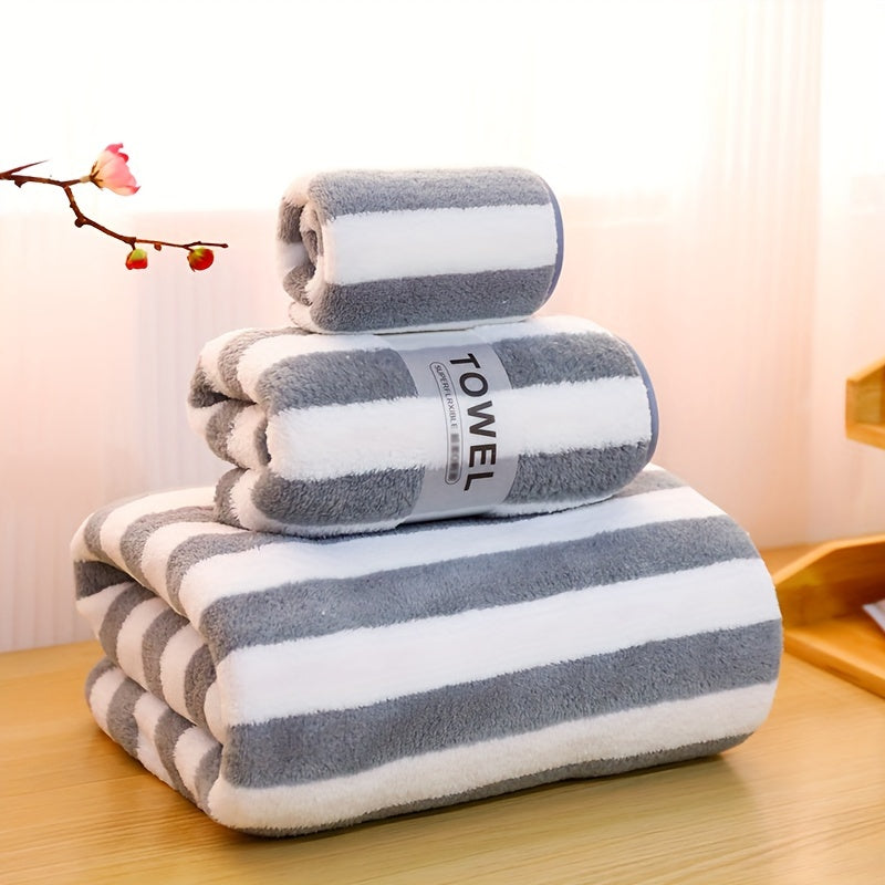 Luxury bath towel set in blue & white stripes - ultra-soft, highly absorbent microfiber. Includes large bath towel, bath towel, and washcloth. Lint-free, skin-friendly for home & hotel use. Ideal for bathrooms.