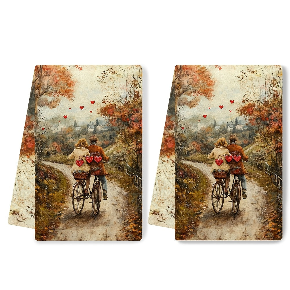 2 Pieces of Ultra Soft Kitchen Towels featuring a couple riding a tandem bicycle decorated with heart-shaped bells down a country lane. These highly absorbent dish hand towels are perfect for holiday decor. They are machine washable and measure 16x24