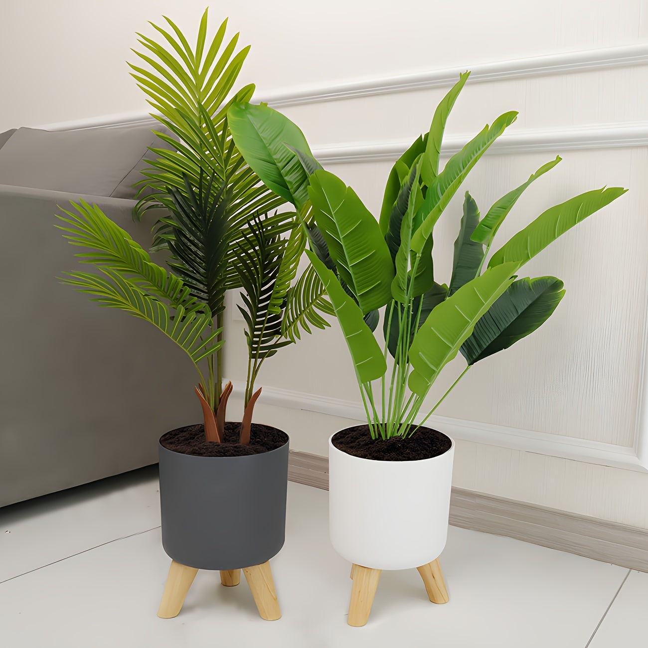 Wooden leg planter for indoor/outdoor use in home or office, suitable for various plants.