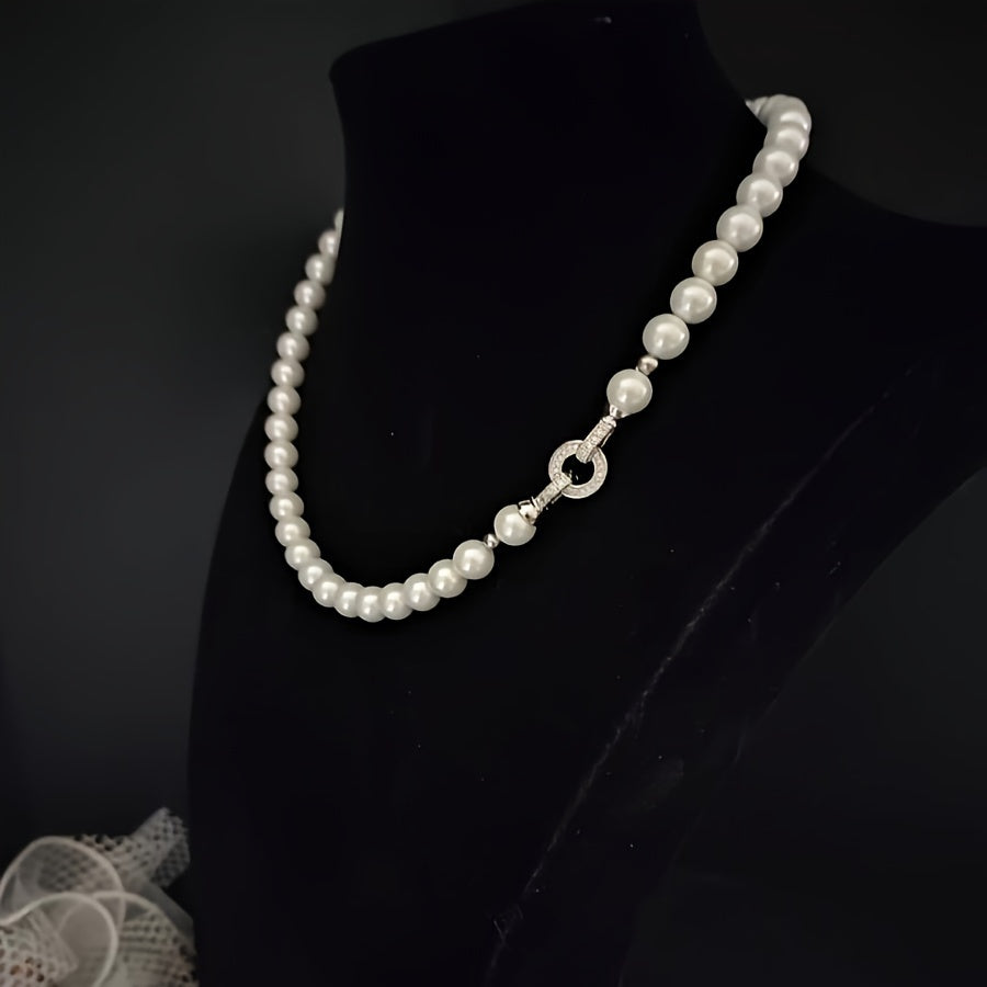 Impeccably crafted from natural freshwater pearls measuring 7-8mm, this stunning necklace features a silvery diamond round buckle. Presented in an elegant gift box, it is suitable for both male and female recipients and perfect for everyday wear