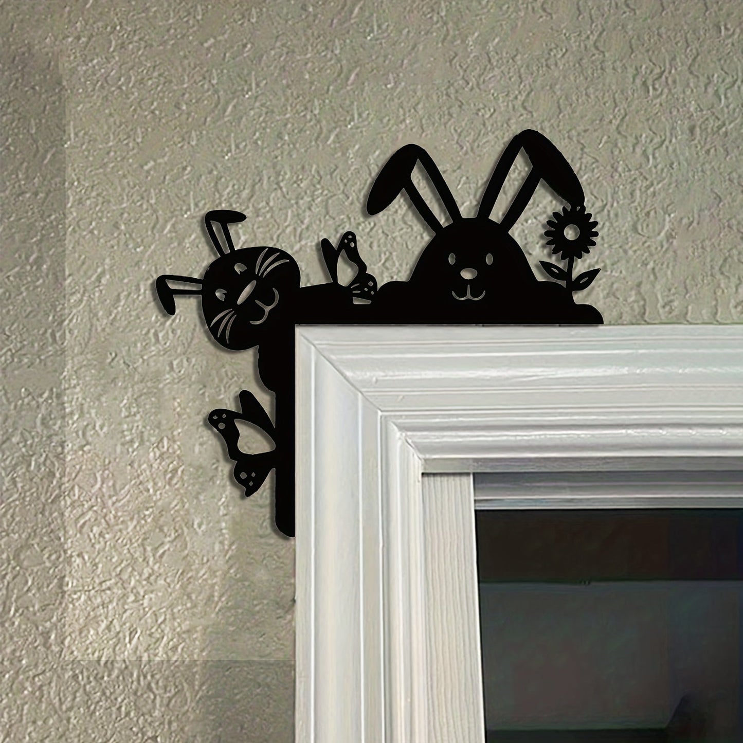 Add a festive touch to your home with this unique Metal Easter Bunny Logo Decoration that hangs elegantly in the door corner. Crafted from black iron, this charming piece is perfect for adding a festive Easter vibe to any space.