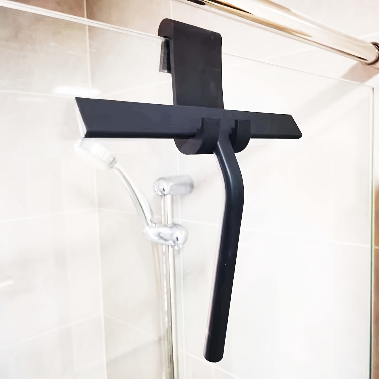 Introducing a versatile Silicone Squeegee designed for shower, glass, and bathroom cleaning. This product boasts an ergonomic handle and convenient storage rack, making it perfect for cleaning living rooms, bedrooms, toilets, and floors.