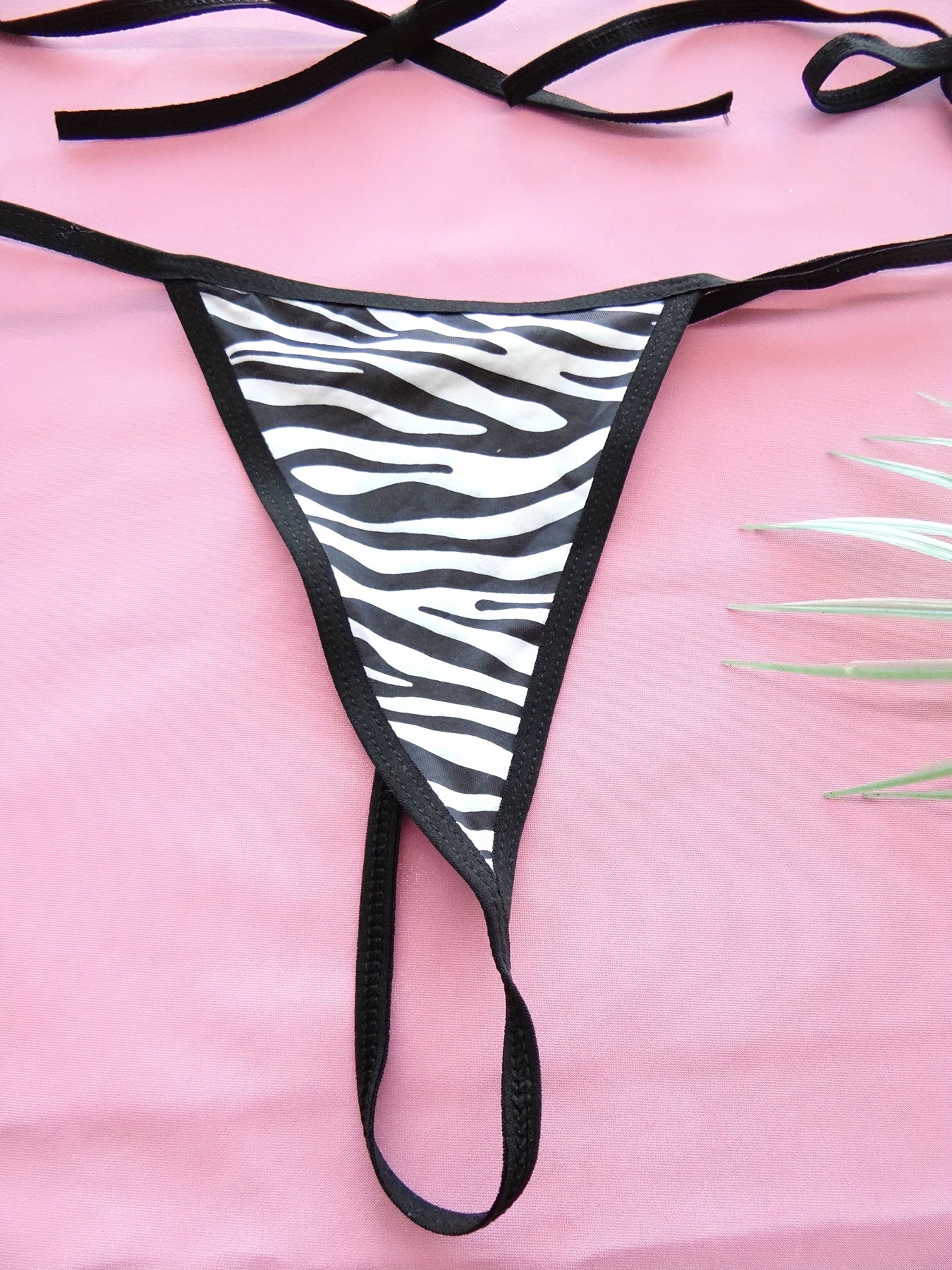 Women's zebra print bikini in sizes S/L, comfortable fit.