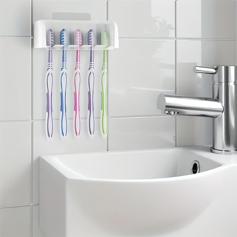 Wall mounted toothbrush holder holds up to 5 toothbrushes, no electricity required, ideal for dorms and showers.