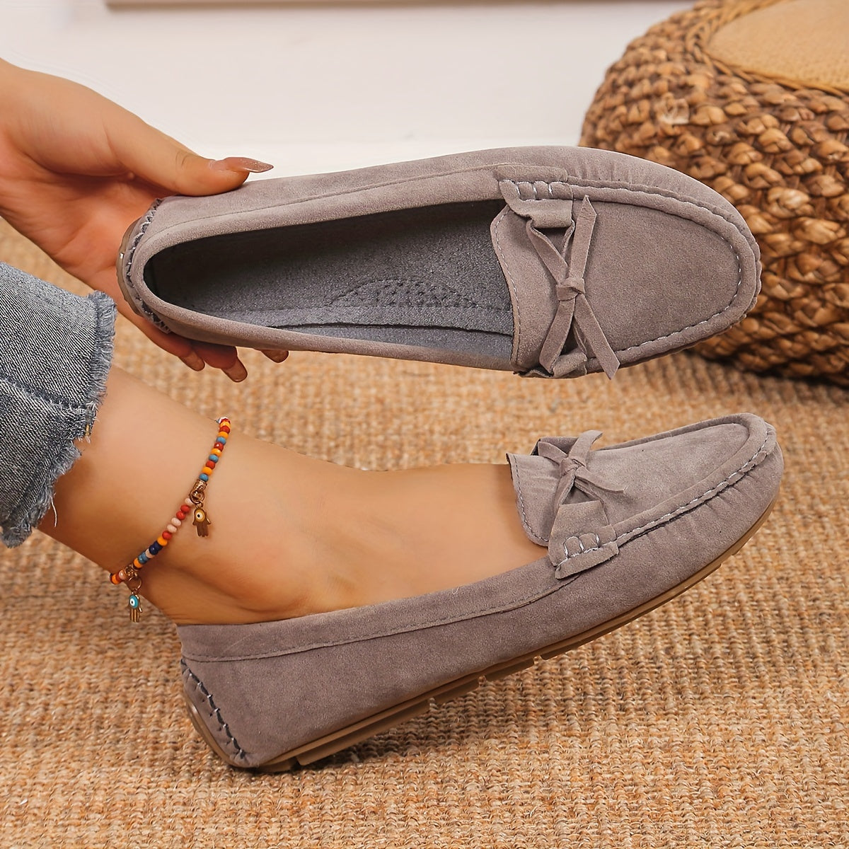 Retro flat loafers with bow detail, slip on style, and soft sole for casual wear.