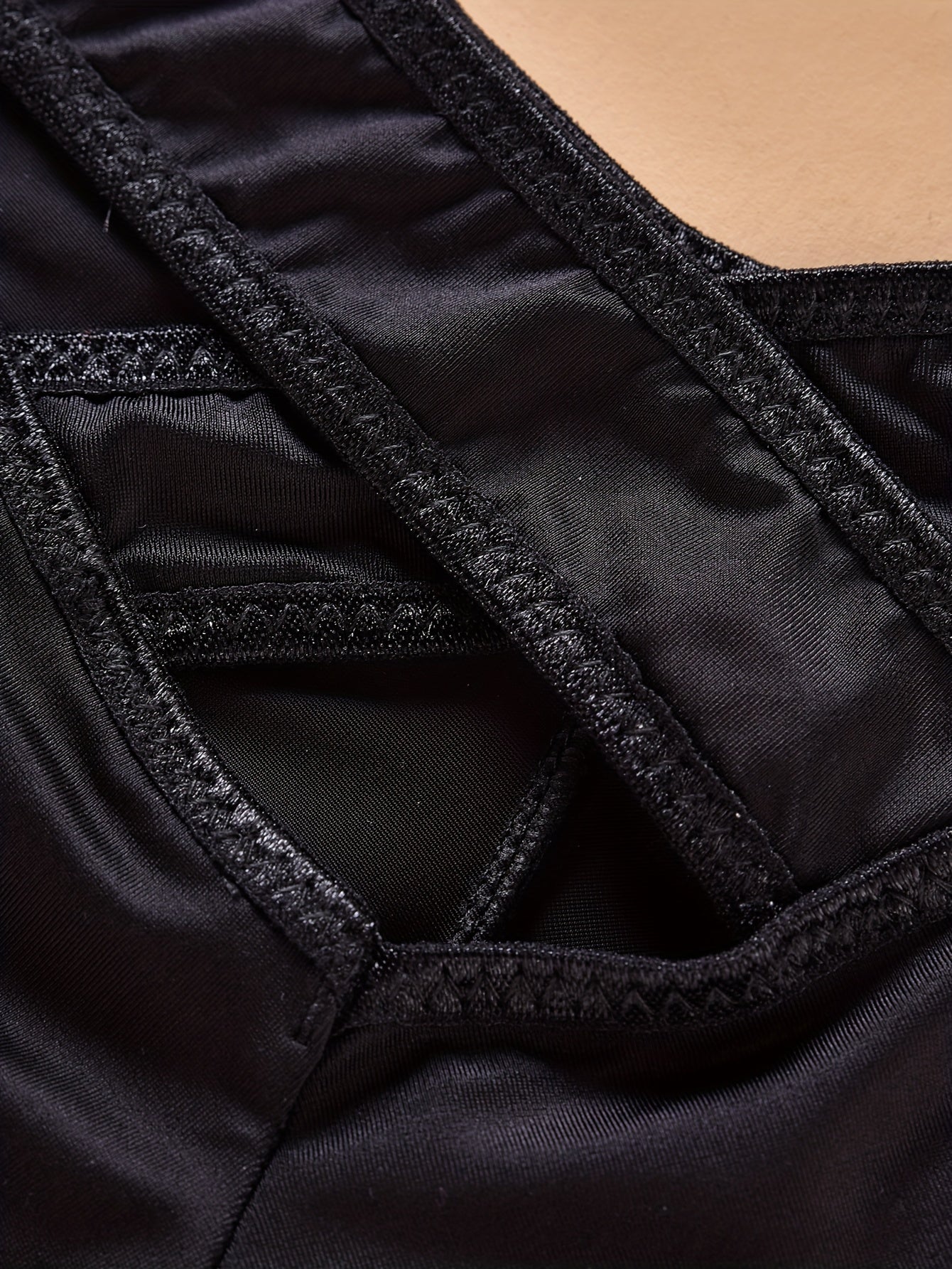 Sexy lace panties with cross strap cutout design in black, red, and white. One size fits most, made with a soft blend of nylon and elastane for breathable comfort. Choose larger size for a