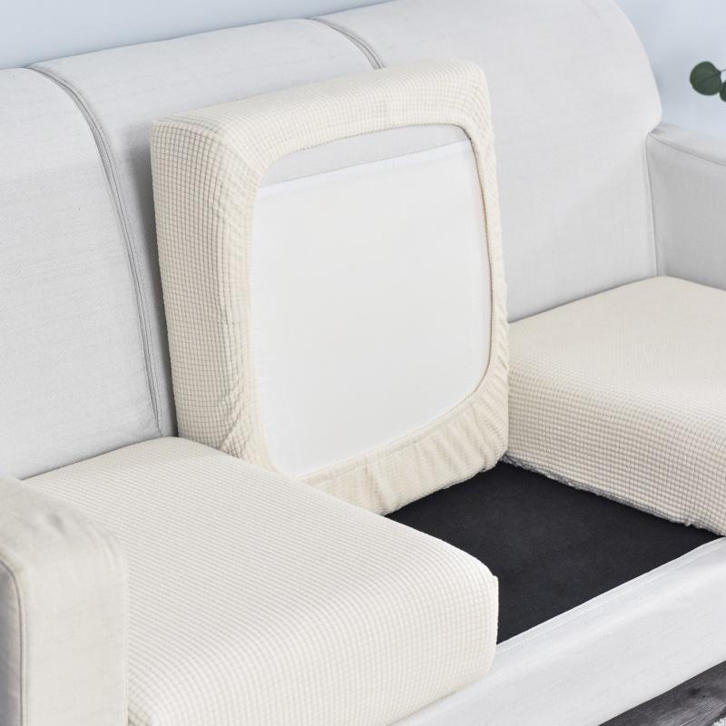 Stretchable and washable polar fleece sofa protector with removable jacquard cushion cover.