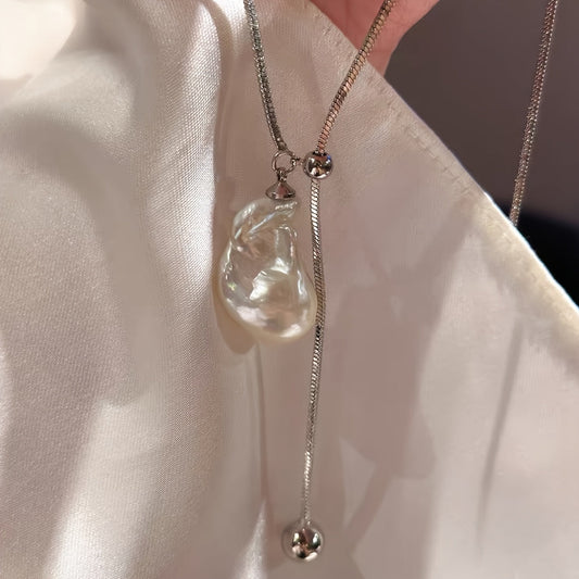 Stylish Y-Necklace with Baroque Freshwater Pearl Pendant, Adjustable Slider, French-Inspired Design, Perfect for Holiday Celebrations, Suitable for Banquets and Festivals, Versatile Addition to Your Seasonal Wardrobe, From the Middle East Collection.