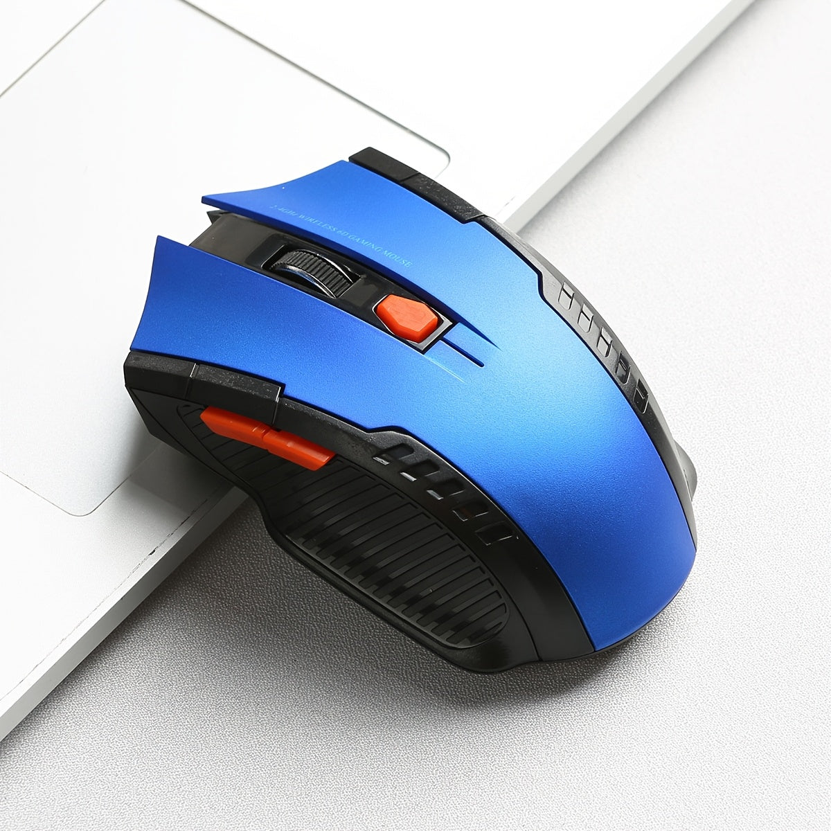 2.4G Wireless Gaming Mouse with ergonomic design, comfort grip, 10m range, adjustable DPI, stylish appearance, suitable for desktop and laptop use, made of plastic material.