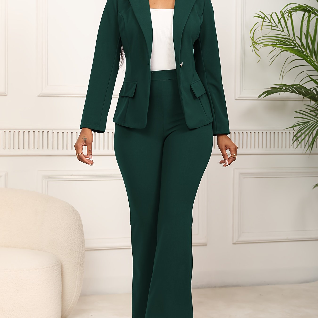 Sophisticated women's work suit set with long sleeve blazer and straight-leg pants made of stretchy polyester blend, machine washable.