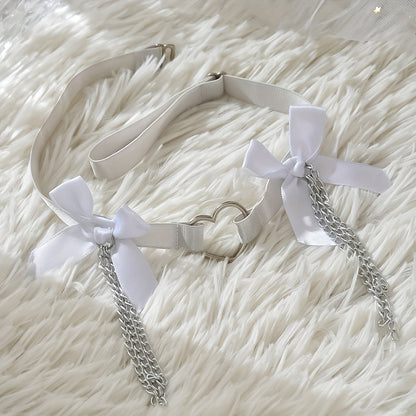 Stylish adjustable leg garter with white bow and heart charm. Perfect for weddings, dance, and costumes.