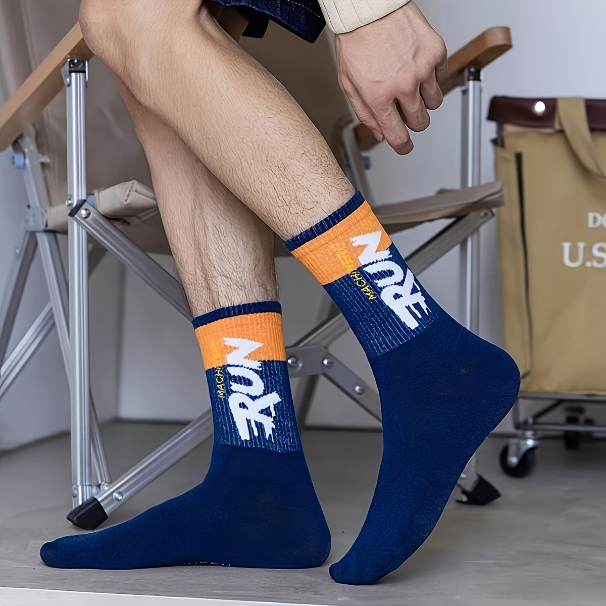 Men's mid-calf crew socks with 5 pair letter pattern, perfect for outdoor sports.