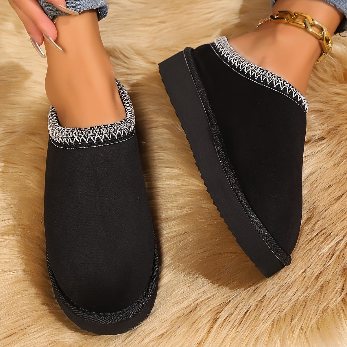 Warm and cozy women's winter slippers with plush lining and anti-slip sole.