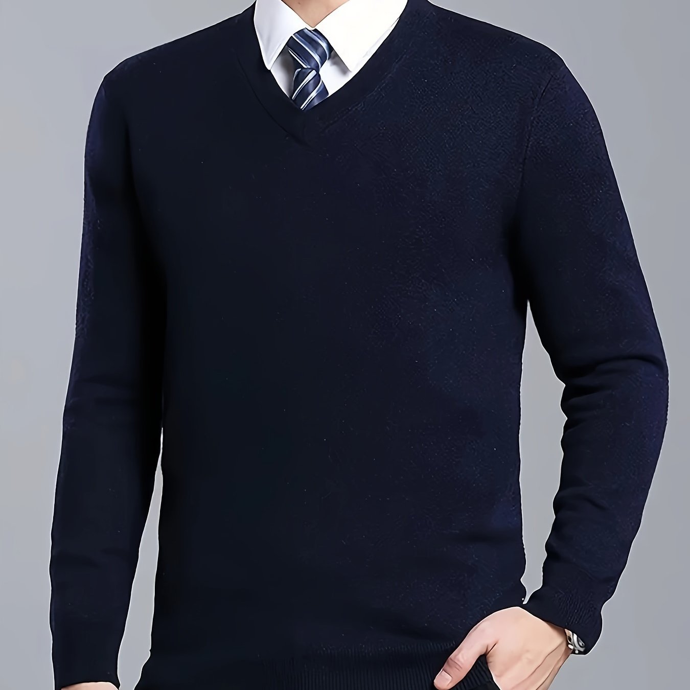 Men's V-Neck Knit Sweater for 2024 Autumn/Winter with solid color design and regular fit. Made from Polyester 25%, Viscose 50%, Nylon 25%.