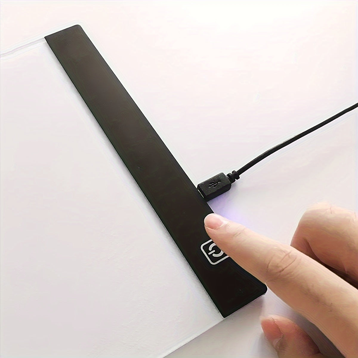 Portable LED copy board for tracing and drawing tattoos, sketches, animations, and stencils. Ultra-thin with adjustable brightness and USB interface.