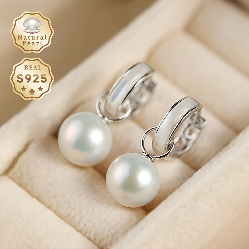 A Pair of Pearl Earrings in a Gift Box - A Must-Have Gift for Women. These fashionable hoop earrings are made of S925 Silver with 10-11mm round natural freshwater pearls. The pearls are removable and add a graceful touch to any outfit. Please note that