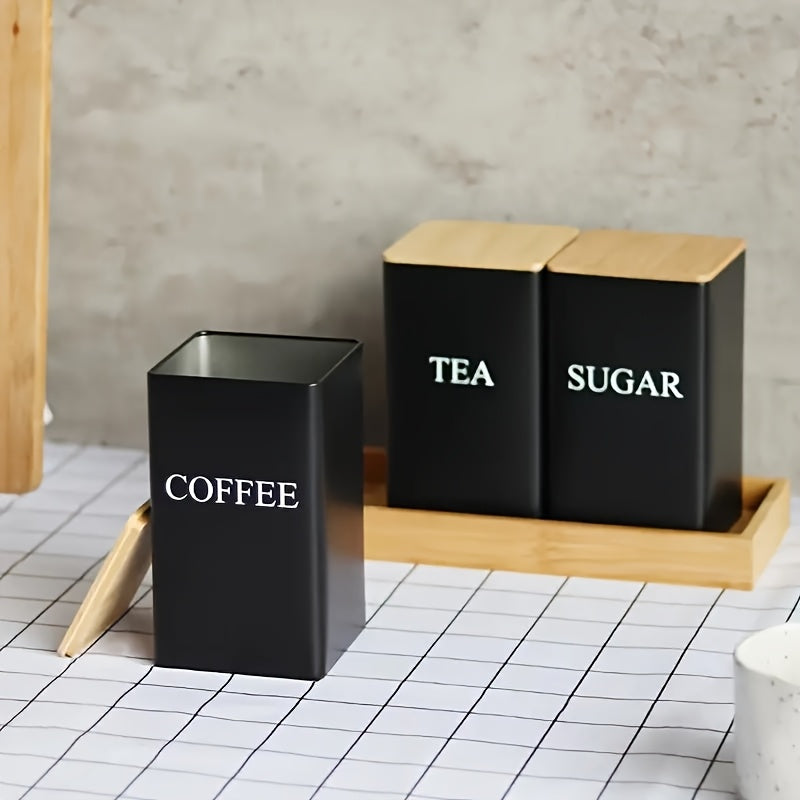 Set of 3 iron kitchen canisters with wooden lids. Washable, uncharged, engraved label storage containers for office and dining. White metal tea, coffee, sugar dispensers.