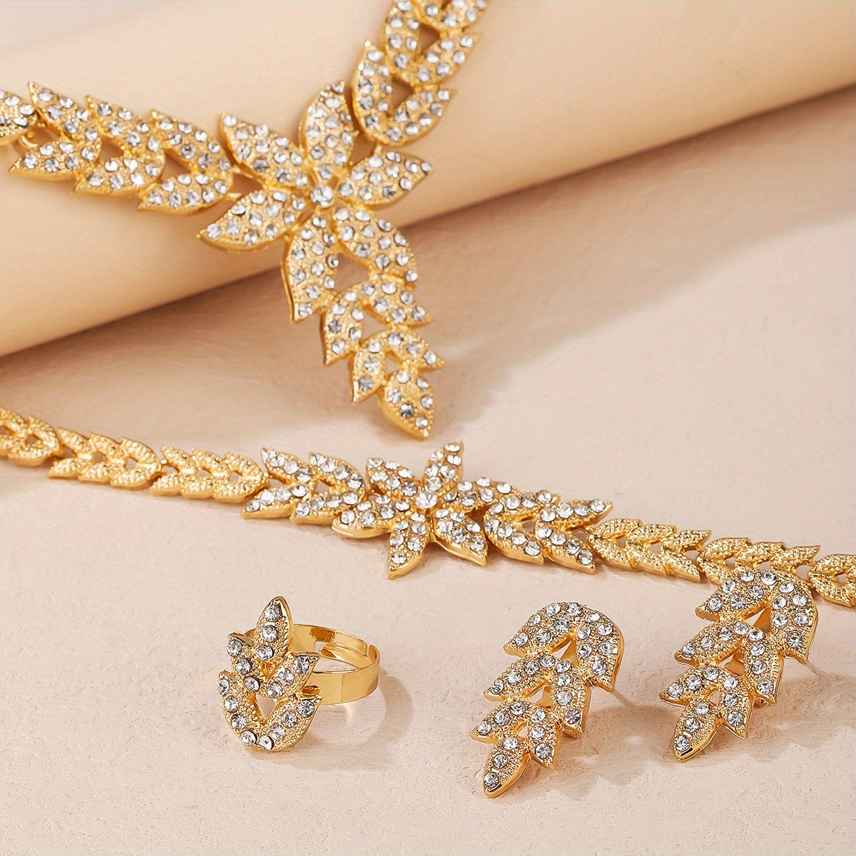 Beautiful Wedding Jewelry Set for Women: Gold Leaf Rhinestone Necklace, Ring, Earrings, and Bracelet - Perfect Gifts for Eid