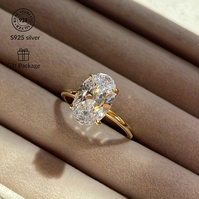 Simple and elegant 14K gold plated S925 silver ring featuring an oval cut synthetic cubic zirconia in 1CT, 2CT, or 3CT. Perfect for daily wear or as a thoughtful gift.