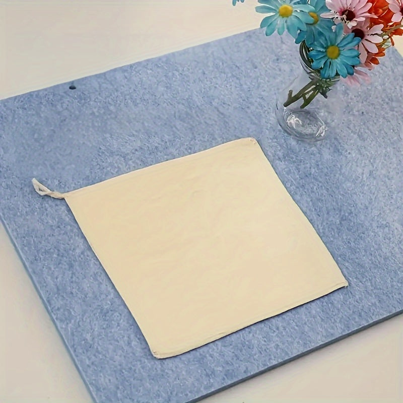 1 piece of Heat Resistant Felt Ironing Pad perfect for Quilting and Sewing Projects, featuring a durable non-slip Clothes Steam Board that is Easy to Iron on. A must-have for apartments, college dorms, and as a Home Office or Travel Accessory.