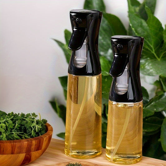 Oil spray bottle for home use, ideal for cooking, suitable for various uses in the kitchen.