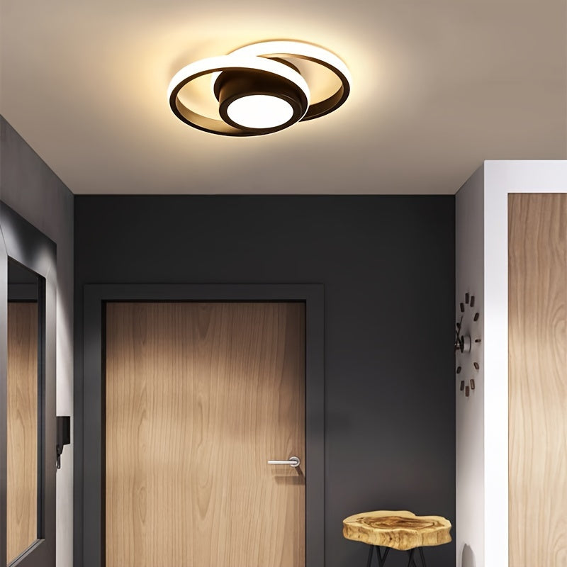 Contemporary LED ceiling light in sleek black design with dual-light source. Energy-efficient and durable, suitable for bedroom, bathroom, and kitchen. Features wide voltage range, 3-color