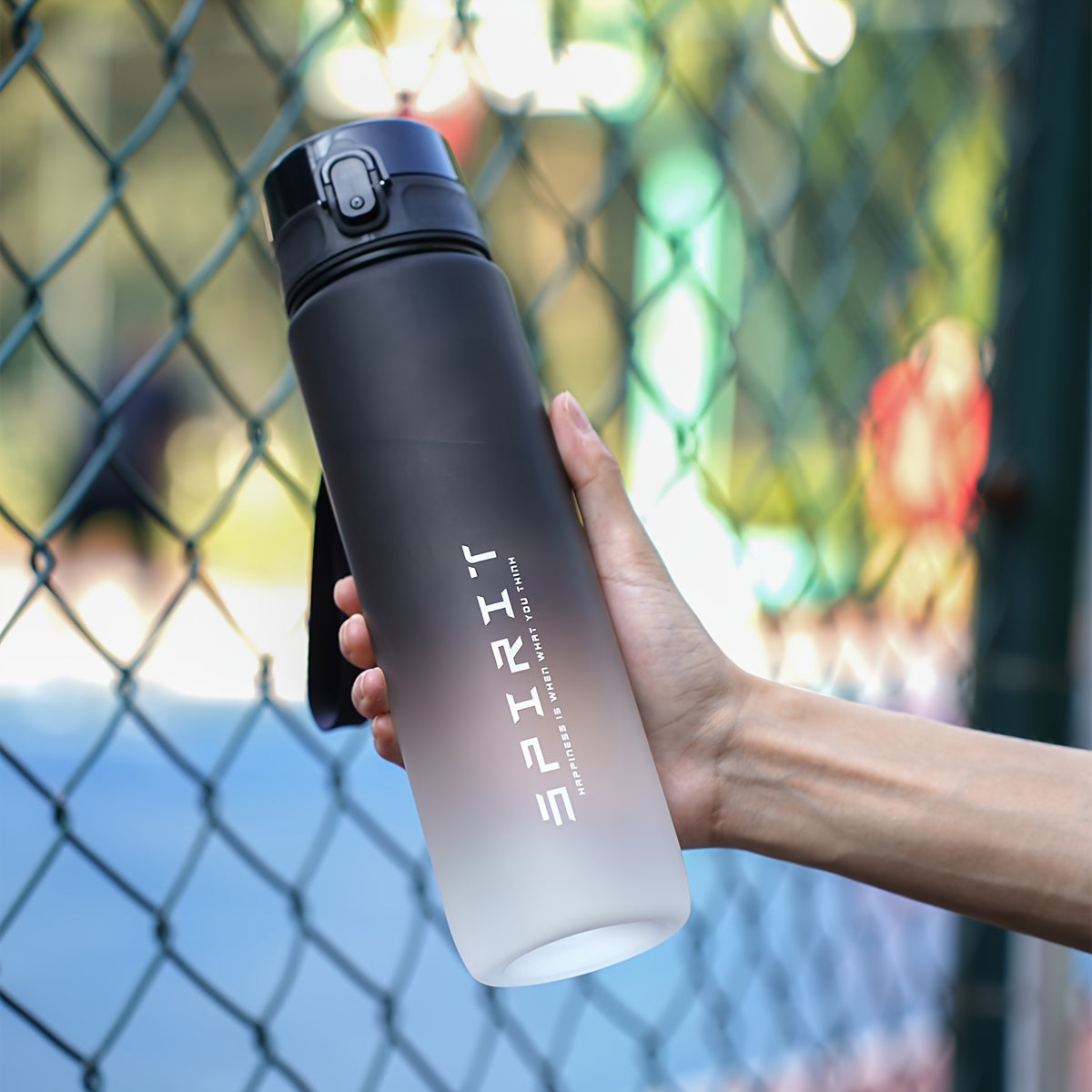 Portable Gradient Sports Water Bottle in 26oz or 10.5oz sizes, leakproof, dishwasher safe for outdoor use.