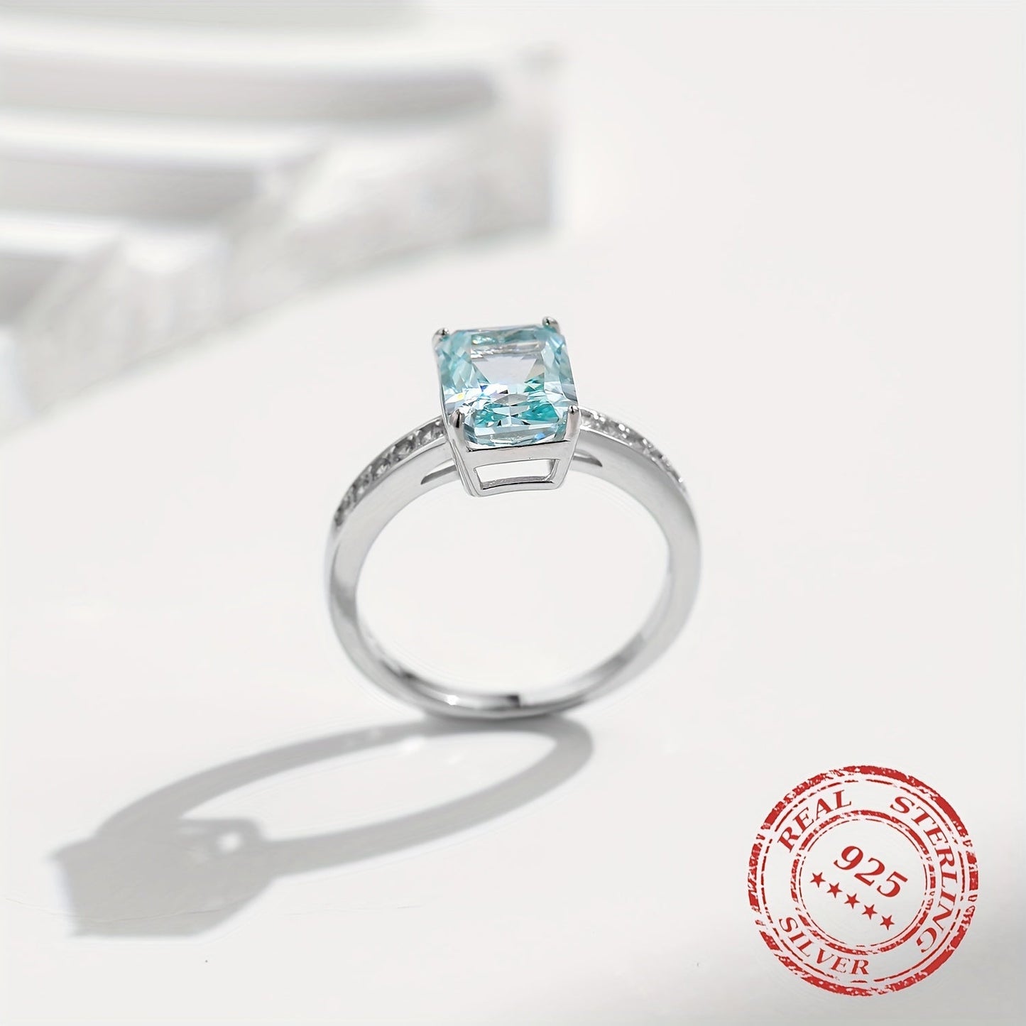 YANLOK presents a stunning 925 sterling silver ring with Paraiba blue cubic zirconia, ideal for gifts and special occasions. This elegant vintage-inspired piece exudes a festive sparkle that is sure to impress.