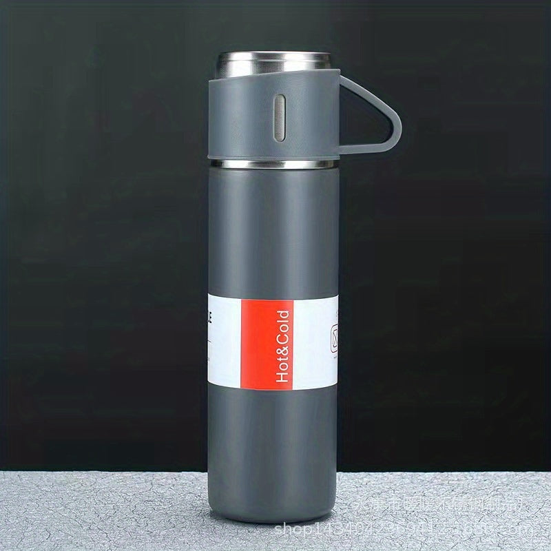 Business thermal mug with stainless steel thermo material, 500ml capacity, vacuum insulated bottle with cup for hot and cold drinks.