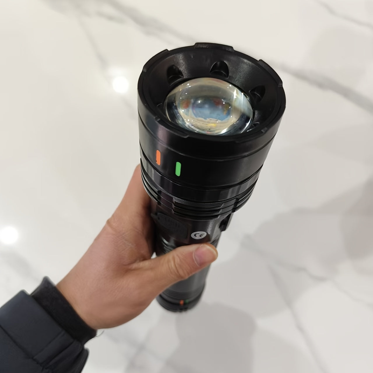 Ultra bright LED flashlight with 1000 lumens, 4 modes, 200m range, and adjustable beam. Includes a 3600mAh lithium battery that is USB Type-C rechargeable. Made of ABS material and suitable